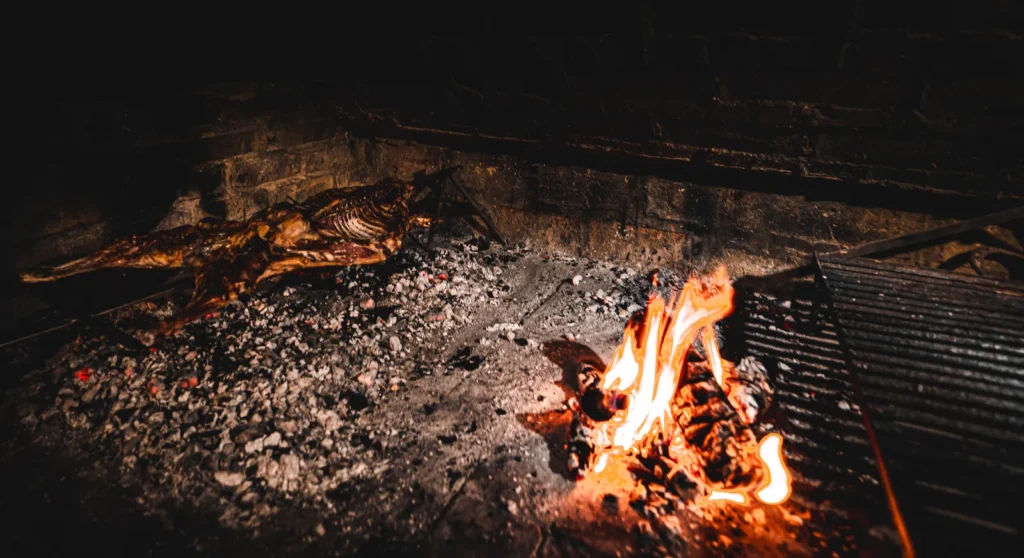 Campfire embers at night at the mobile fishing camp